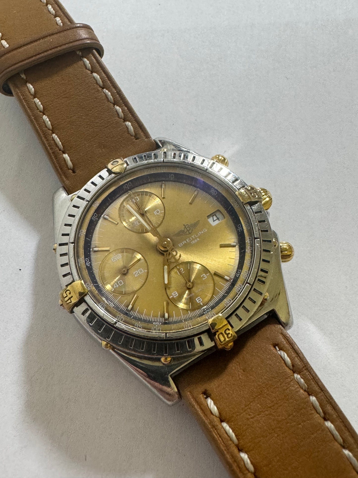 Bristling chronomat gold dial