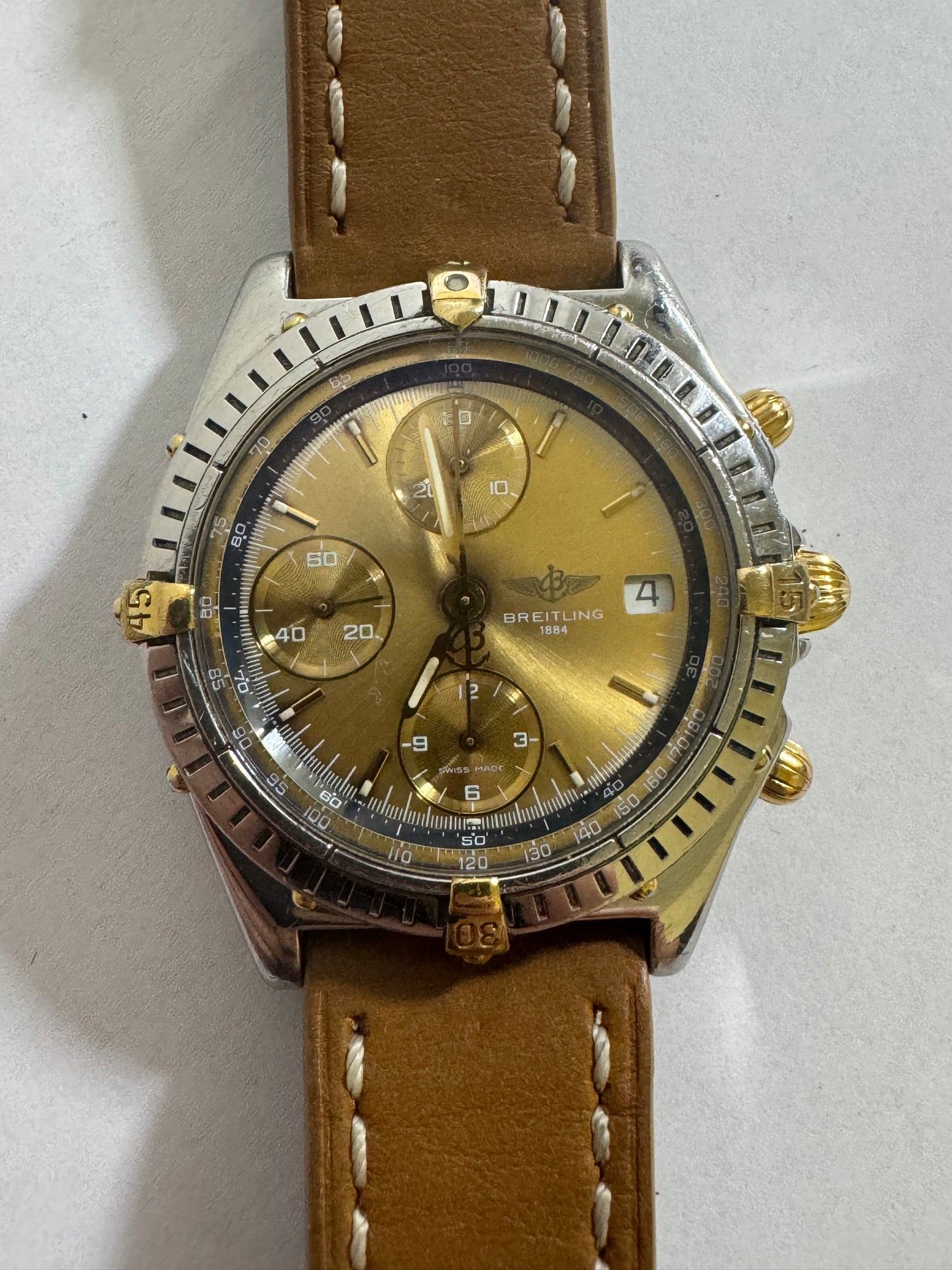 Bristling chronomat gold dial
