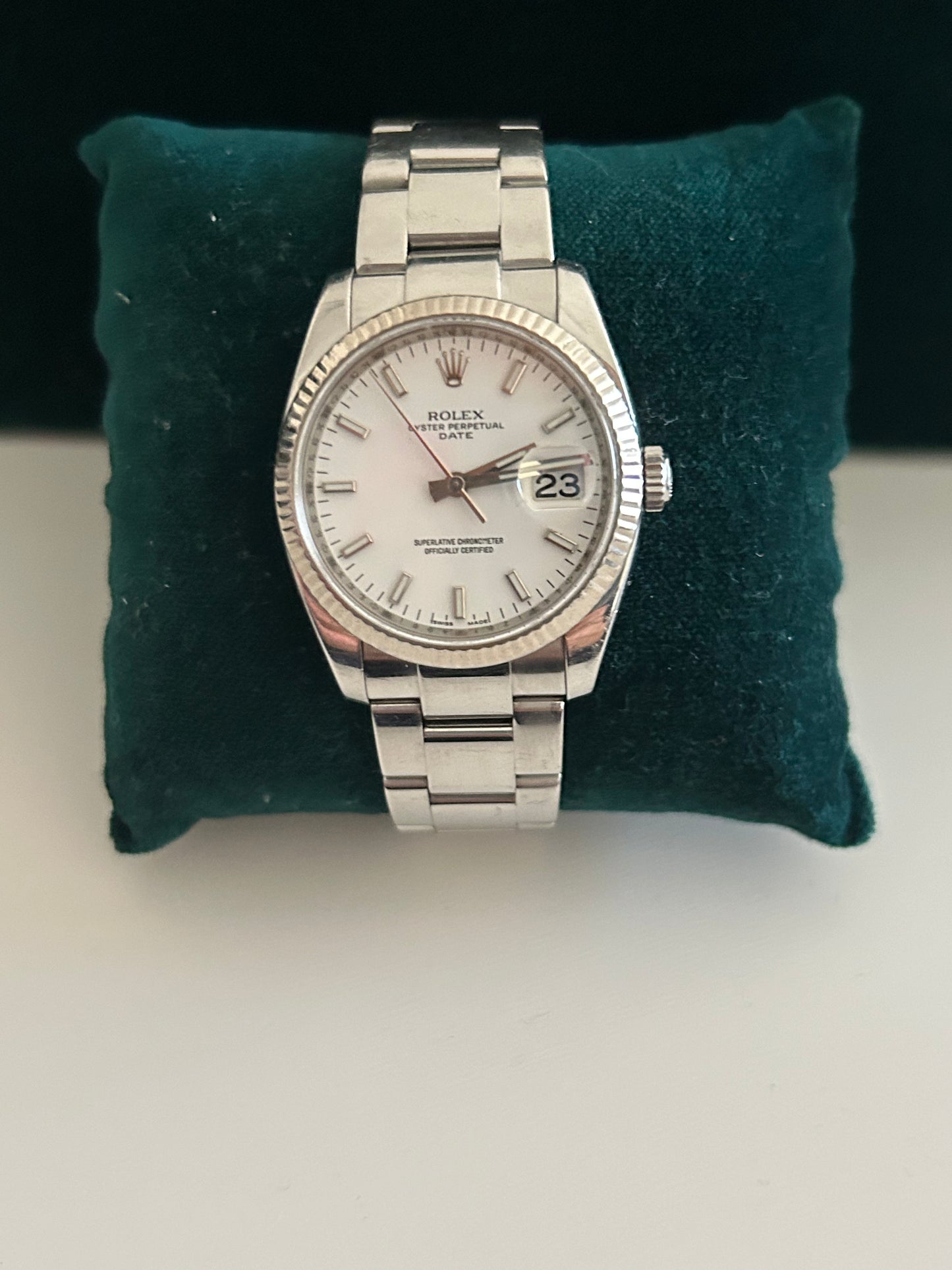 Rolex Date 115234 white gold bazel