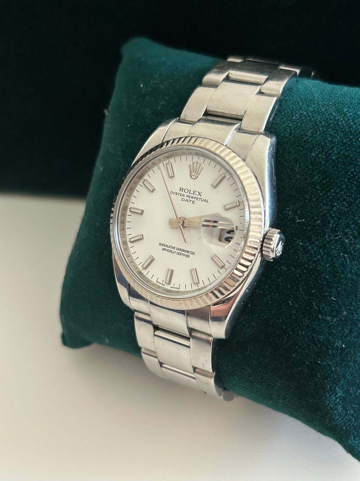 Rolex Date 115234 white gold bazel