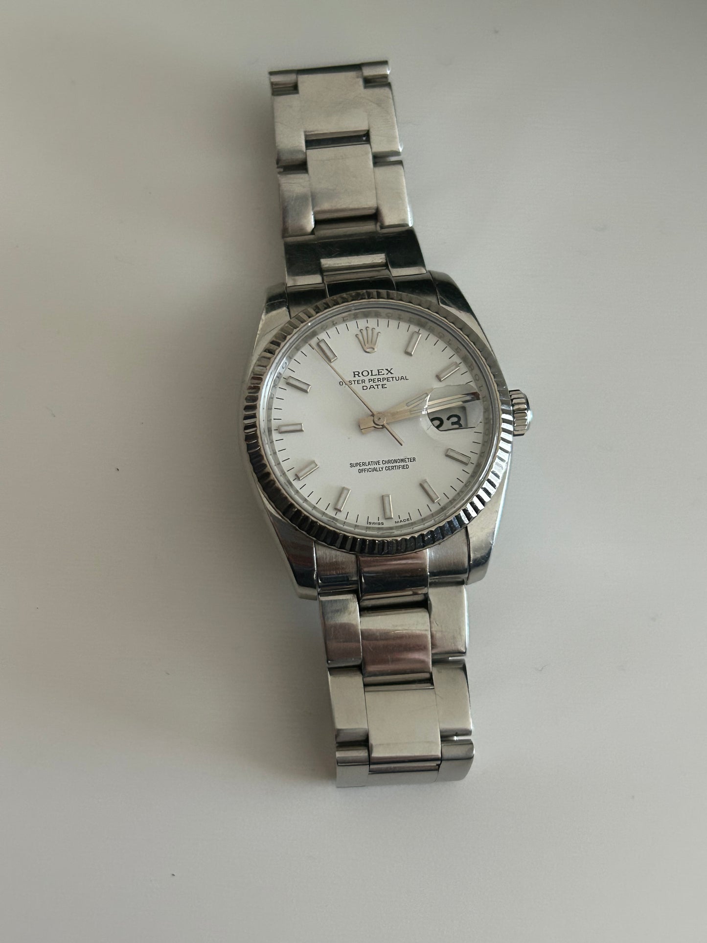 Rolex Date 115234 white gold bazel
