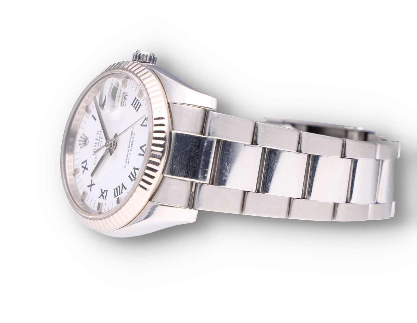 Rolex Date 115234 white gold bazel