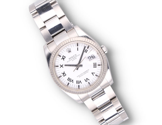 Rolex Date 115234 white gold bazel