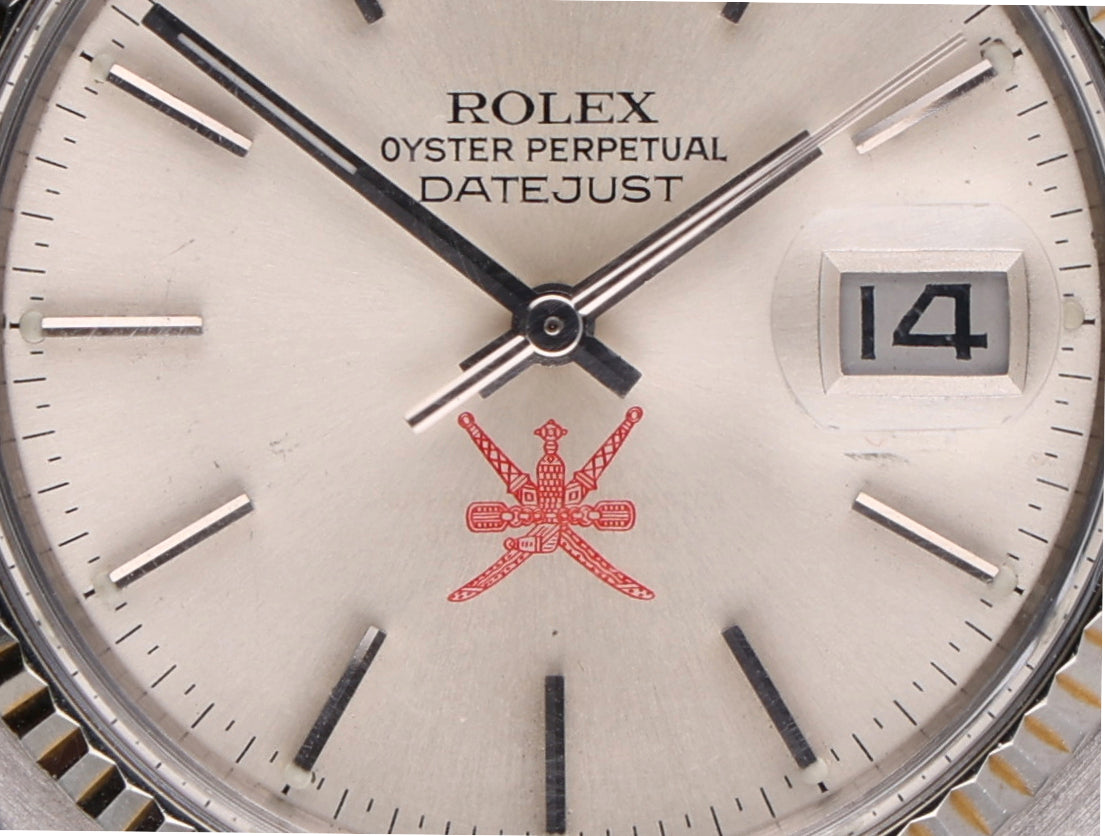 Rolex 16014 Oman logo