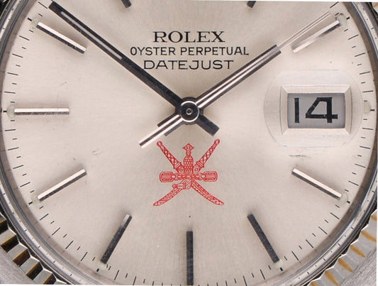 Rolex 16014 Oman logo