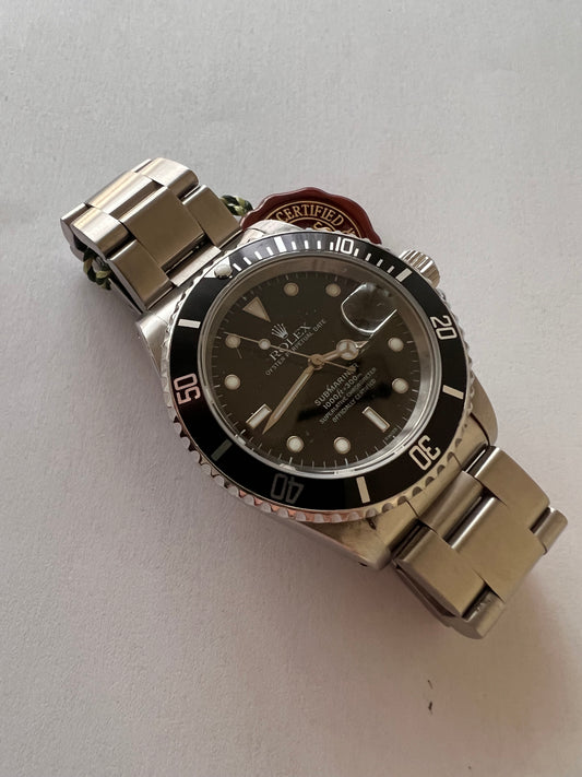 Rolex submariner 16610 only swiss dial