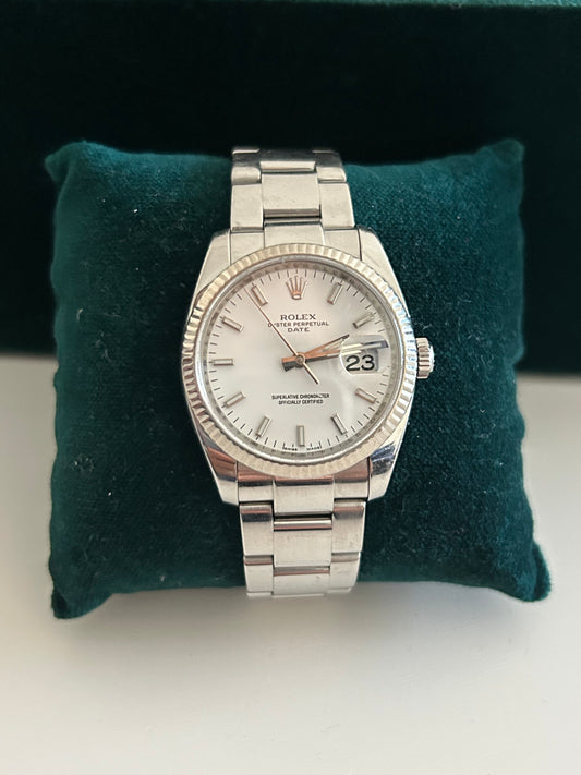 Rolex Date 115234 white gold bazel